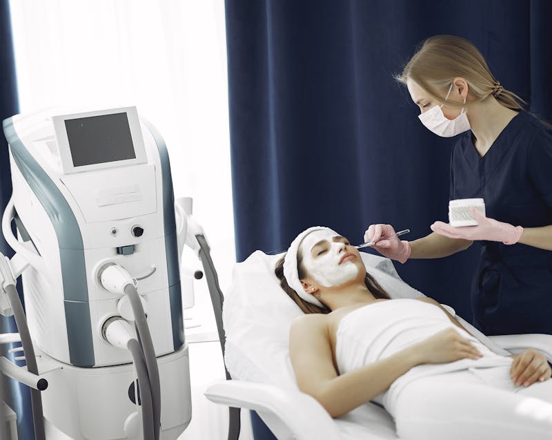 a woman having a facial treatment